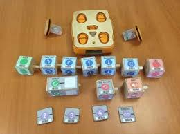 A Kibo Robot with programming blocks and components.