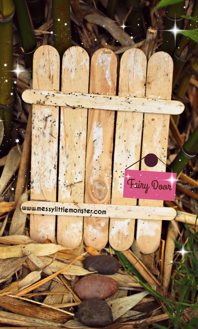 A fairy door built out of craft sticks
