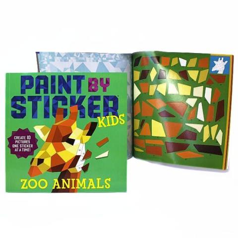 The image shows a Paint by Sticker book in front of an open page from the paint by sticker book. The open page has stickers for creating an image on it.