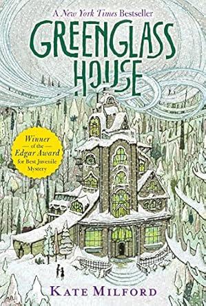 The cover of the book, "Greenglass House" depicts an unusual house, several stories tall, with green glass windows, in the middle of the woods, with wind and snow swirling around it.